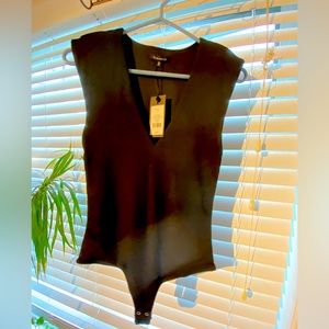 NEW WITH TAGS. Black Vneck bodysuit with shoulderpads
